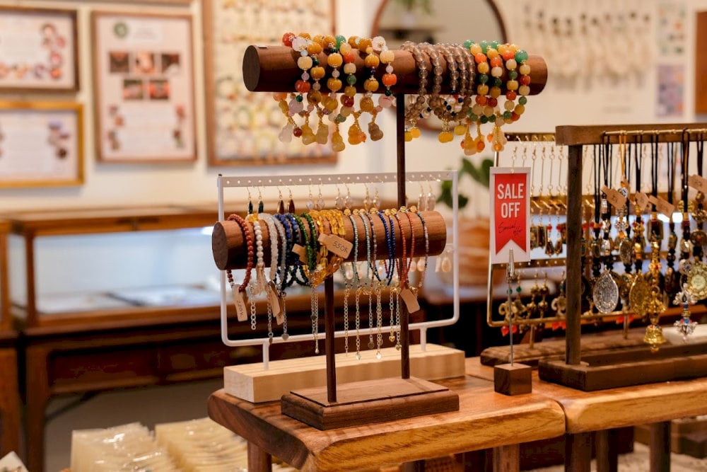 The jewelry stall at Nguyen Nguyen showcases handmade silver pieces, offering delicate beauty and making a perfect gift for women